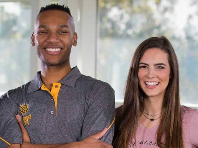 Man and woman smiling for a picture